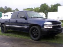 My truck after painting 20's, bumpers, mirrors, grills and bowtie black. Tinted windows, 8,000K Hid Conversion,  Leveling shackles, Soon to get a repaint. 100% black on black.