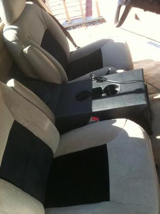 New bucket seats with custom console/speaker box housing 2-8" Rockford Fosgate subs that I built.  Replaced carpet, head lining, and pedals.