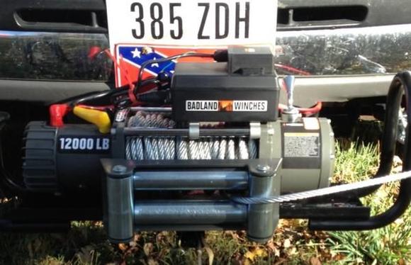 Just some more pics of the winch tested my truck hooked up to a tree and winched it all the way without any problems other then my battery gauge going to almost nothing looks like ill need to invest in a higher amp alternator or better battery