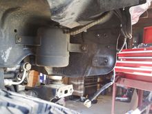 Don't want to have ugly stock parts and guts hanging out from below or elsewhere, so started chopping stuff. Will do more chopping, maybe some sheet metal to cover things up later.