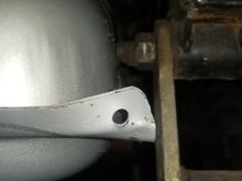 Tank barely fits between top shackle bolts which suprised me since others who have done this swap did not have the same issue. This was a very very rough fit. Sure could go a hair higher but probly end up modifying the corners of the tank