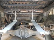 I mounted the tank using center of shock mount but once up i wanted to scoot back just a hair away from the axle. So i just bolted some tabs to the shock mount and moved the tank back 1.250"
