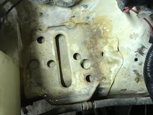 Wire brushed and painted over the rust