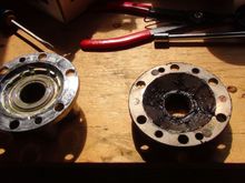 These are the hub and flange back side beside each other, as you can see it is a straight swap. are not picking up the comparison the difference is that there is a 'bearing' in the hub where the flange is fixed.  the lock to the bearing is in the cap which I painted.
