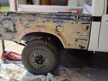 Stripping the bed liner stuff off the bed.