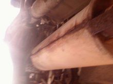 my muffler, as you can see its in poor shape. Planning on getting a new exhaust here shortly. Ill post a couple of pics when I get it done.
