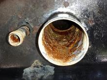 Tank fill rust