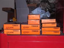 Pics of wheel bearings and races, knuckle bearings and races, and new seals.