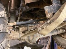 front axle strapped up to the frame before removing the tires and pulling the 3.0 to get more room for the engine hoist