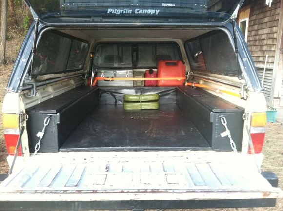 Little view of the storage coming together.  Test fitting some gas, tools, shovel on the right, avalanche shovels back left, axe fits in right hand compartment under shovel, some other fluids, straps, etc stashed about. Best storage solution for now. New locks and fresh gas lifters on canopy.