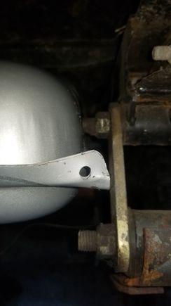 Tank barely fits between top shackle bolts which suprised me since others who have done this swap did not have the same issue. This was a very very rough fit. Sure could go a hair higher but probly end up modifying the corners of the tank