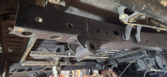 I didn't anticipate needing it but i precautionary marked center of the rear shackle mounts before cutting them off.