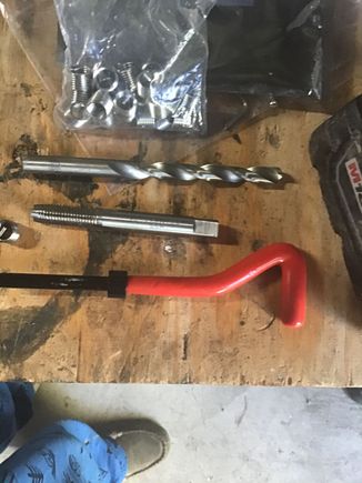 Drill bit, tap, helicoils, and install tool kit. 