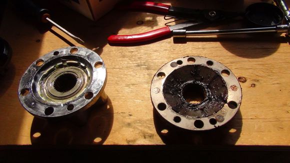 These are the hub and flange back side beside each other, as you can see it is a straight swap. are not picking up the comparison the difference is that there is a 'bearing' in the hub where the flange is fixed.  the lock to the bearing is in the cap which I painted.