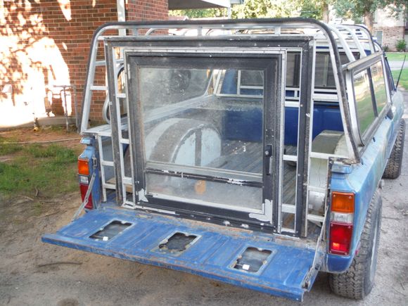 and at camp I can lower the tail gate to give my camper a porch!