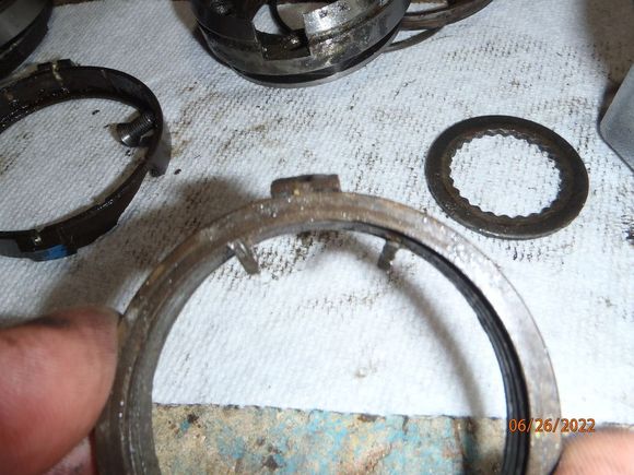 the spring ends in the brake assembly.  these two ends will fit in the gap shown in the above photo, thus the need to align the gap properly
