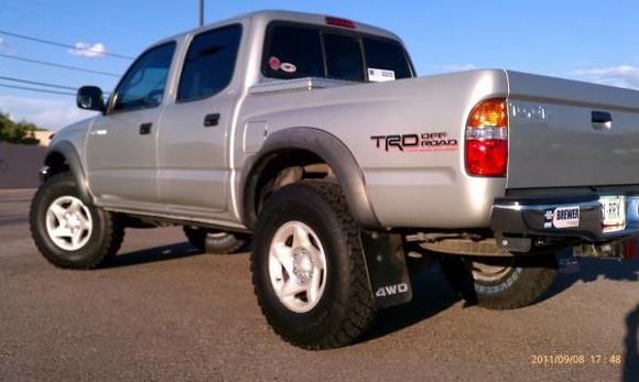 My 2002 with Cooper Discoverer ST 255/85/16's, thanks "oly884" for the input.