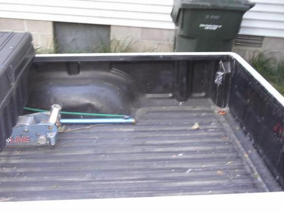 Flex seal used for bed coating (2 cans) and free aluminum hydrolic floor jack