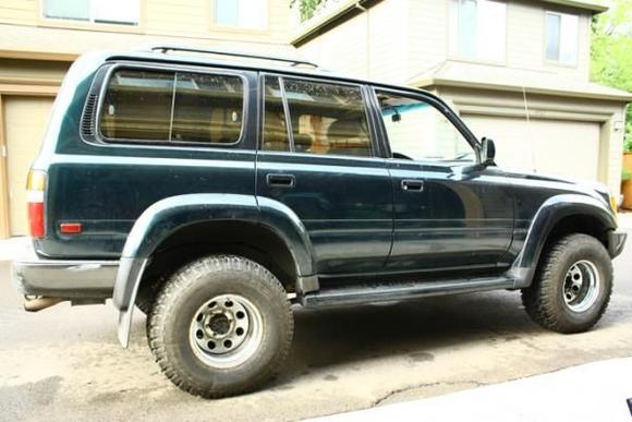 My car after the new struts and 32x12.5r15's are put on (and the back brakes are ground to clear the rims).