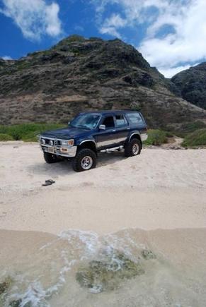 Sittin pretty in the sand - beach near the middle of the trail... BAD idea to sit in the sand, fully inflated tires...no winch or tow rope and SOFT sand...