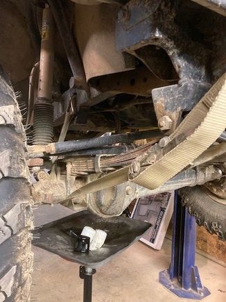 front axle strapped up to the frame before removing the tires and pulling the 3.0 to get more room for the engine hoist