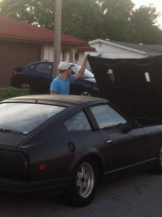 Just got dropped off 10 minutes before this. Already diggin' under the hood.