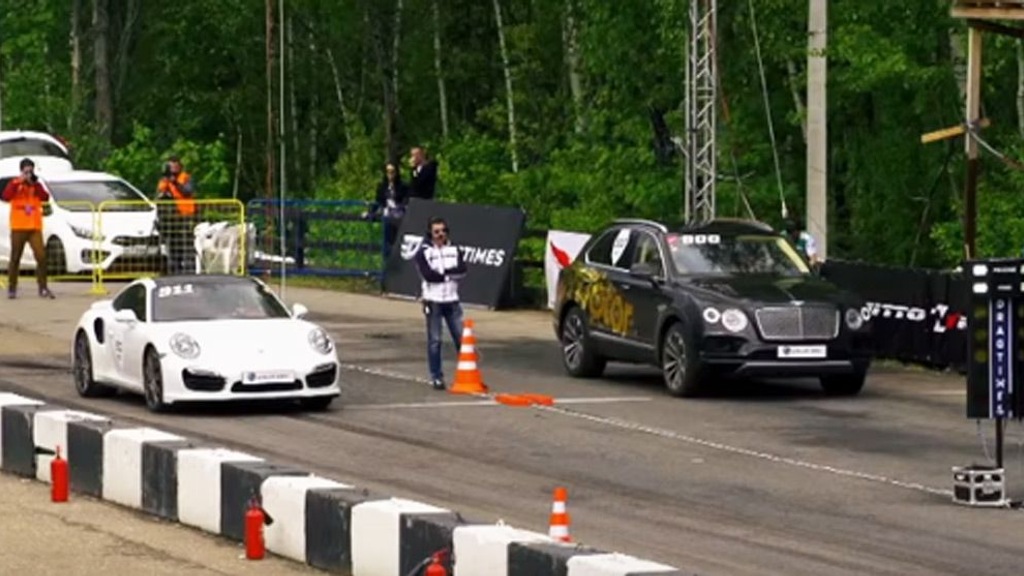 Porsche 911 Turbo and Bentley Bentayga at a drag strip