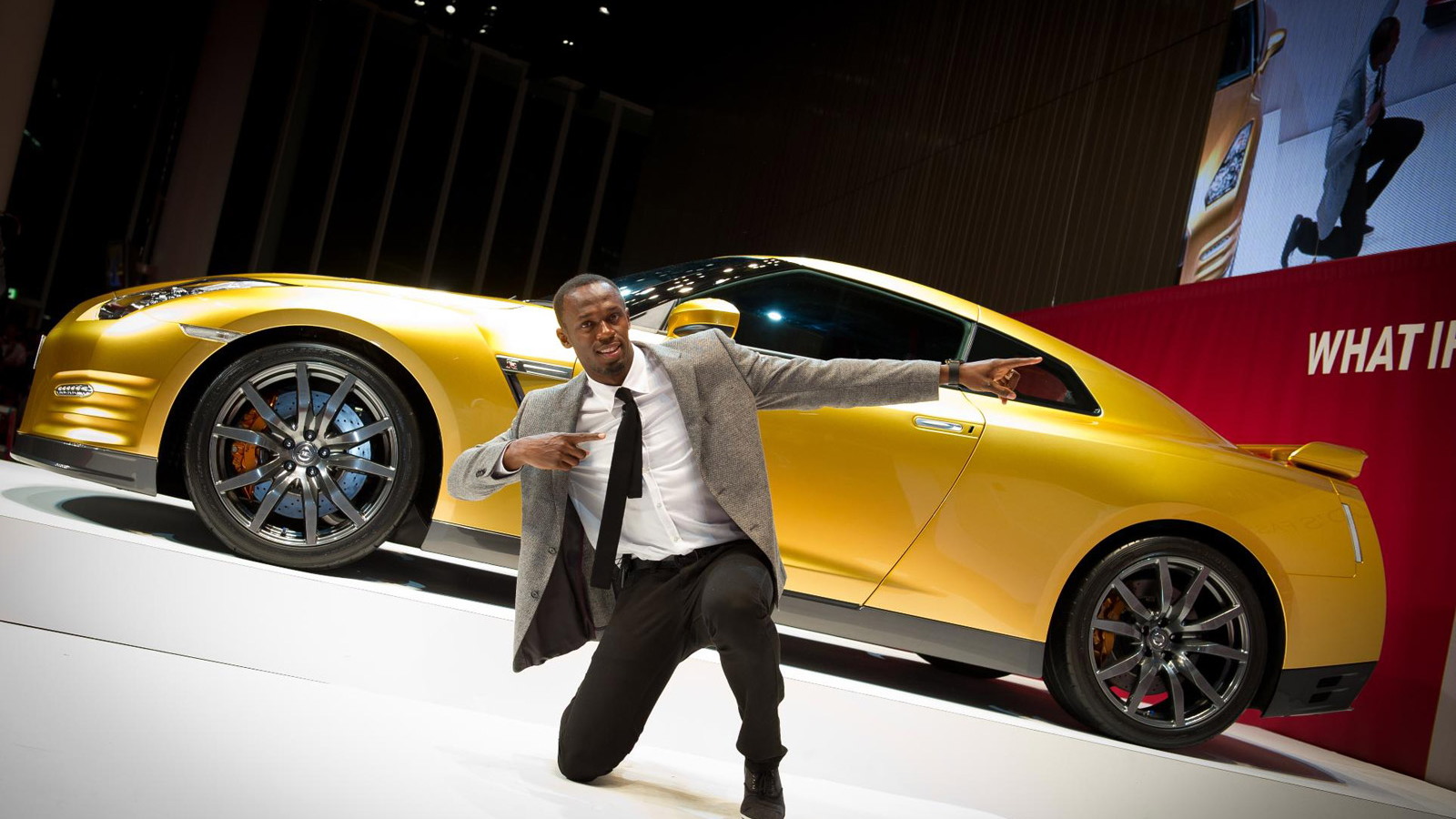 Usain Bolt and his personal gold Nissan GT-R