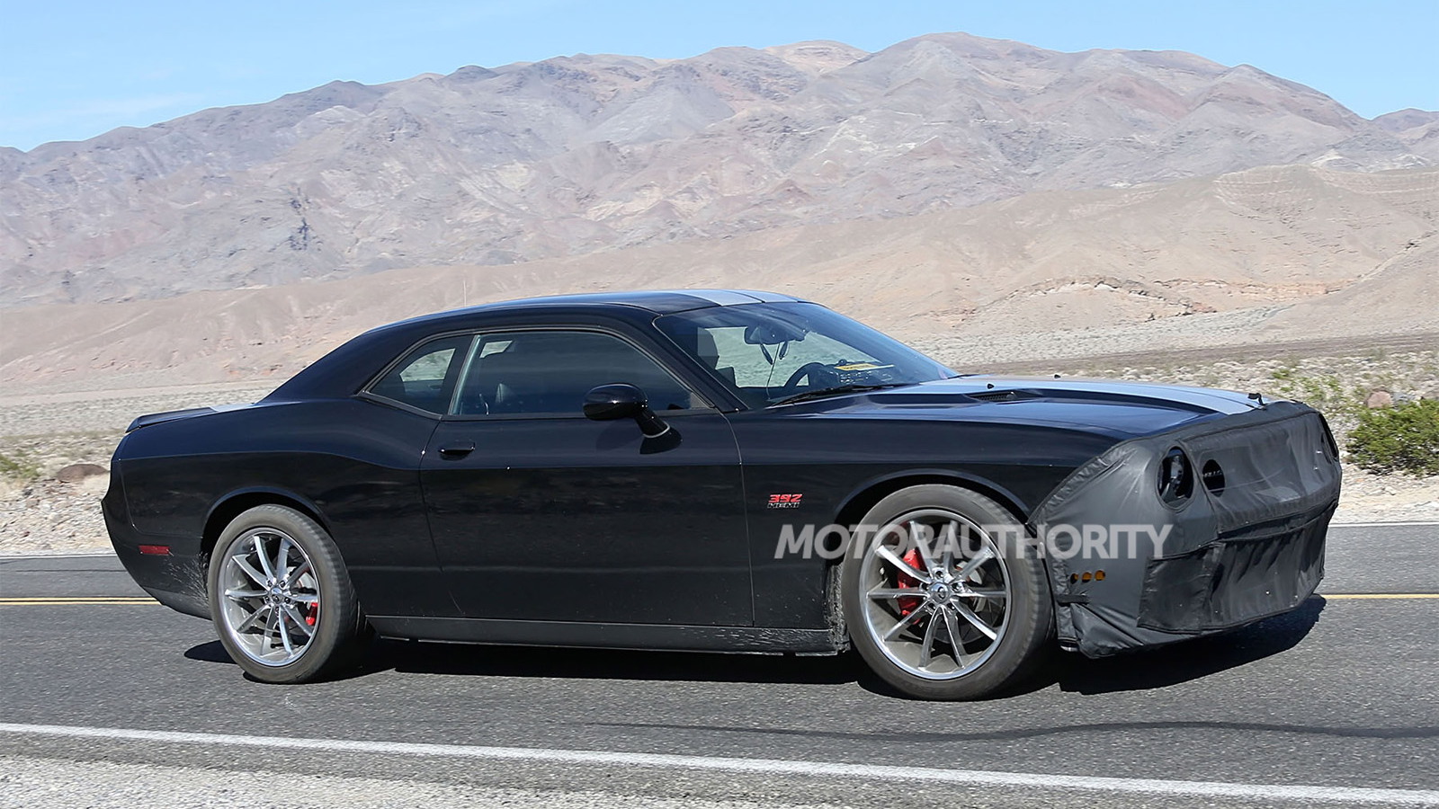 Spy shots of a 2015 Dodge Challenger SRT powered by the ‘Hellcat’ supercharged HEMI V-8