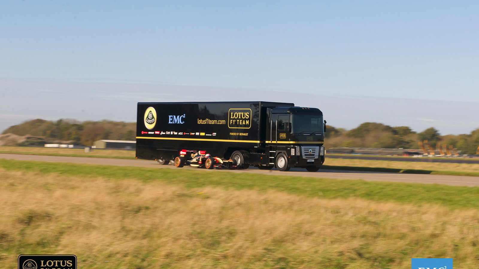 Semi-trailer jumps a moving Formula One car