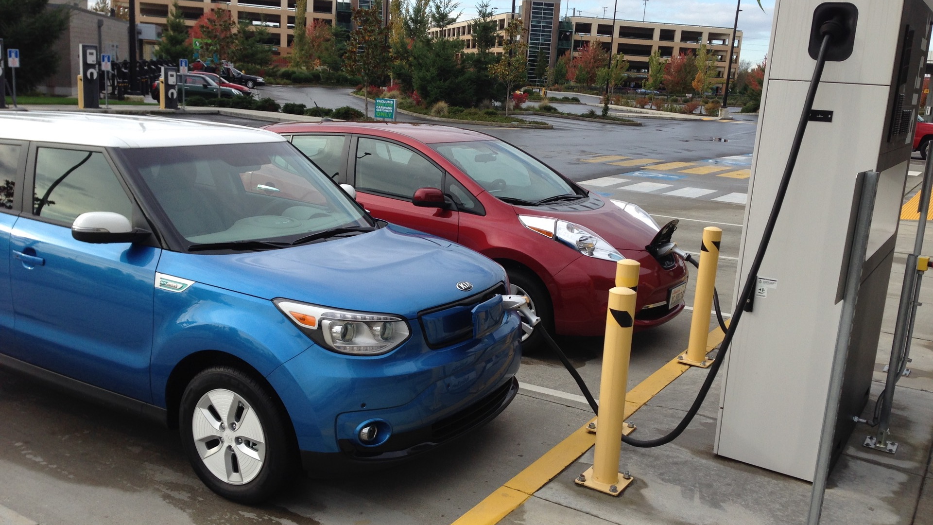 2015 Kia Soul EV and 2014 Nissan Leaf, at Blink DC fast charger  -  Fife, WA
