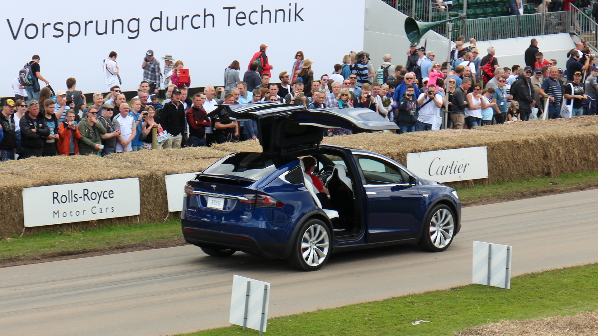Tesla Model X descending the hill course at 2016 Goodwood Festival of Speed