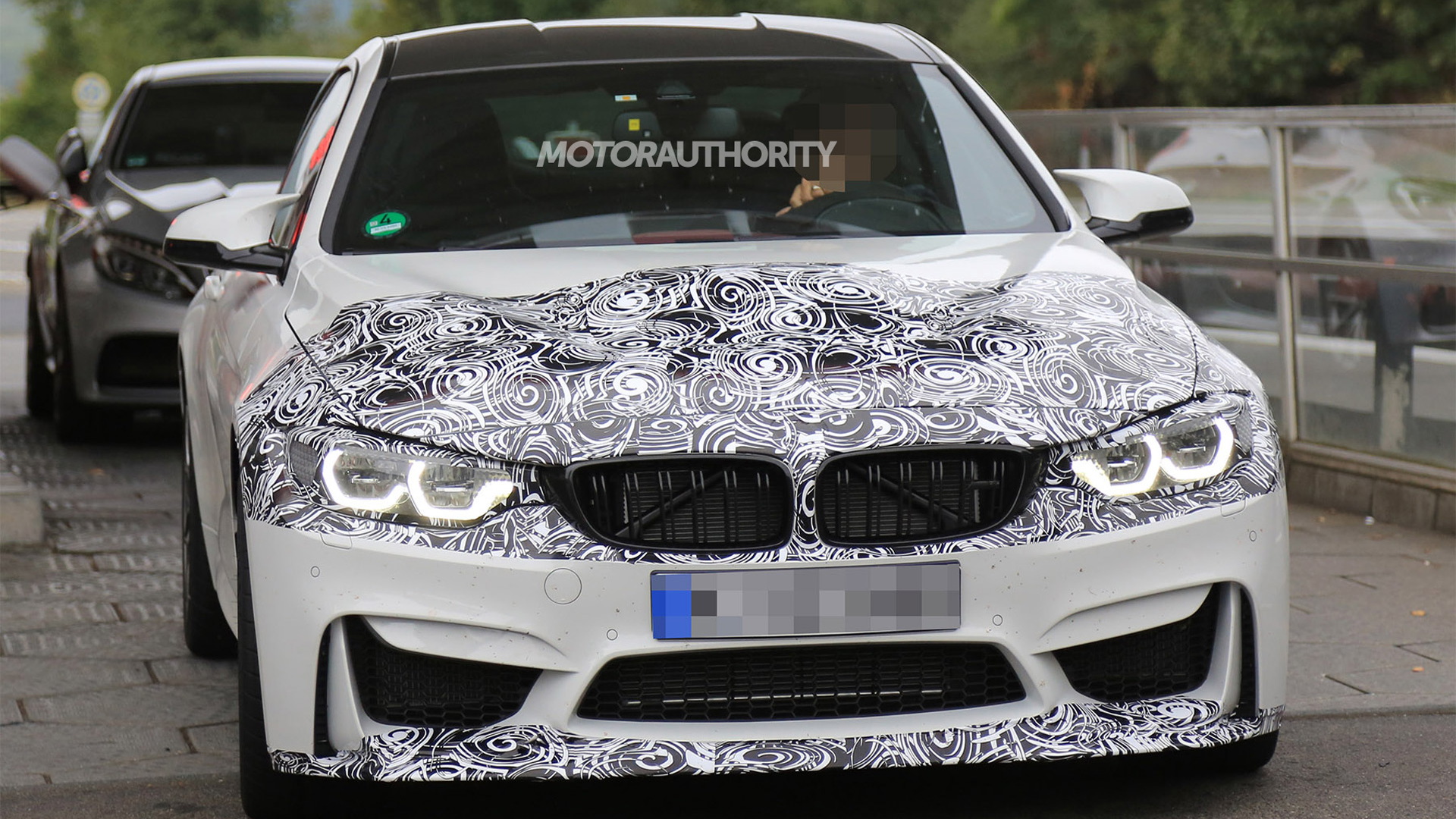 2018 BMW M4 facelift spy shots - Image via S. Baldauf/SB-Medien