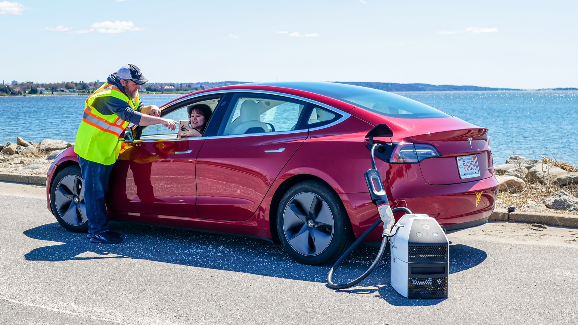 SparkCharge mobile charger with Tesla Model 3