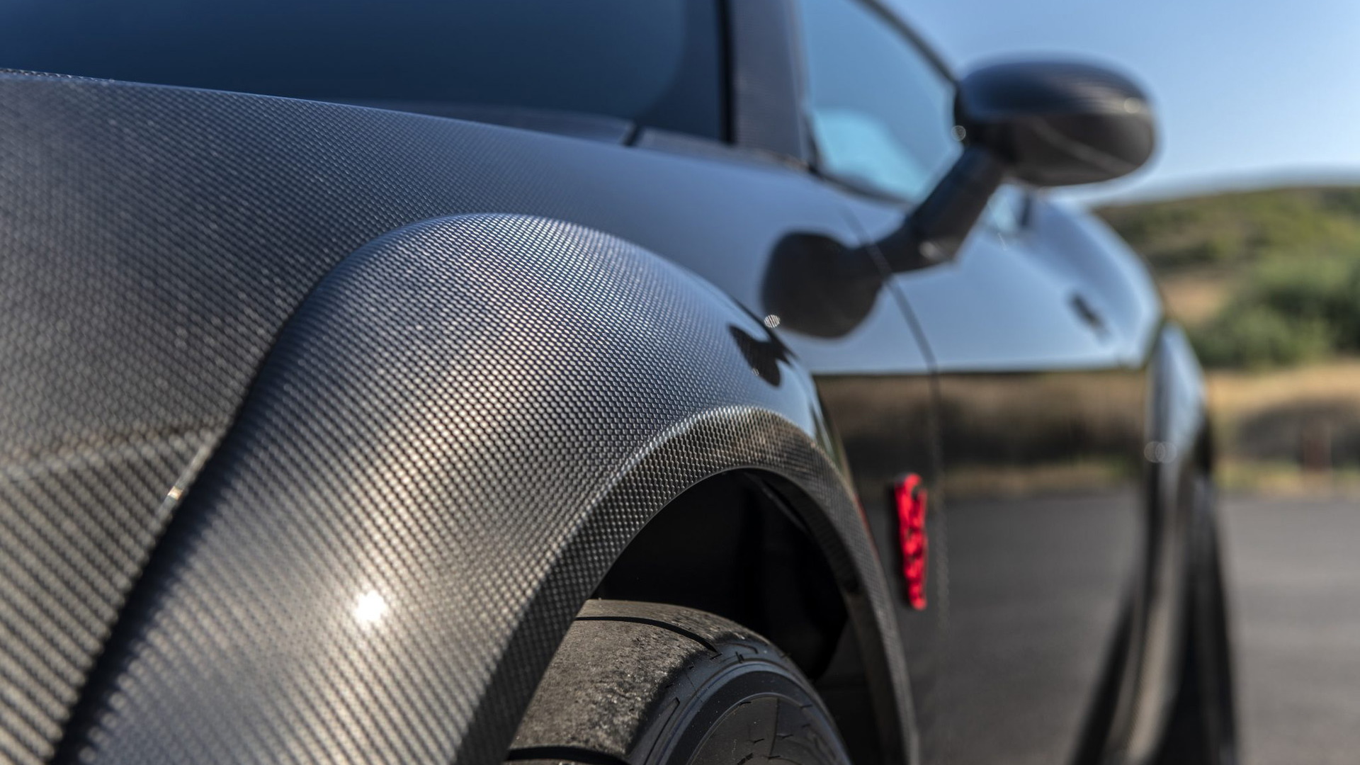 2018 Dodge Challenger SRT Demon with carbon-fiber body by SpeedKore - Photo credit: Bring a Trailer