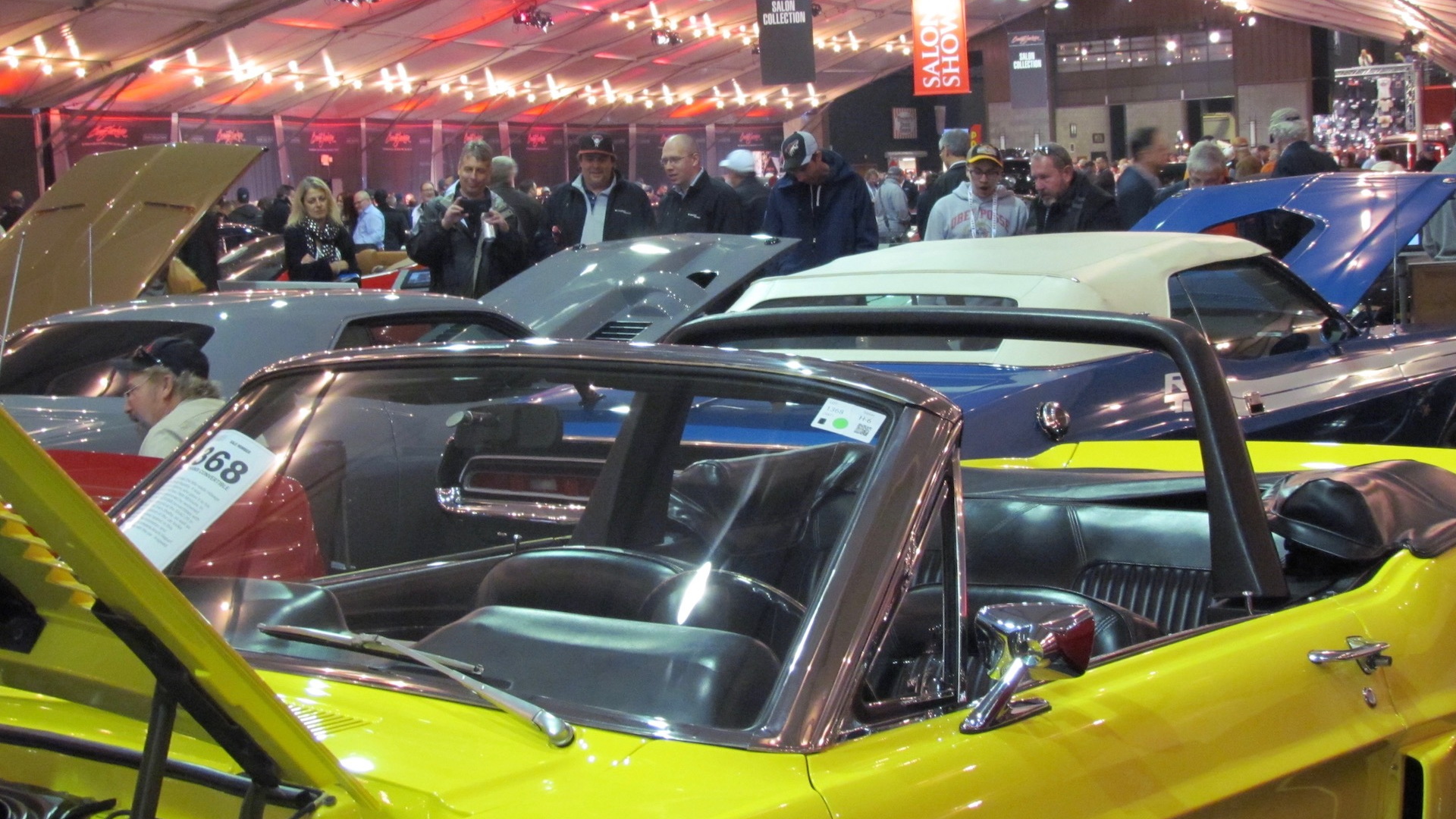 Bidders look over some of the cars at a Barrett-Jackson auction | Larry Edsall photo