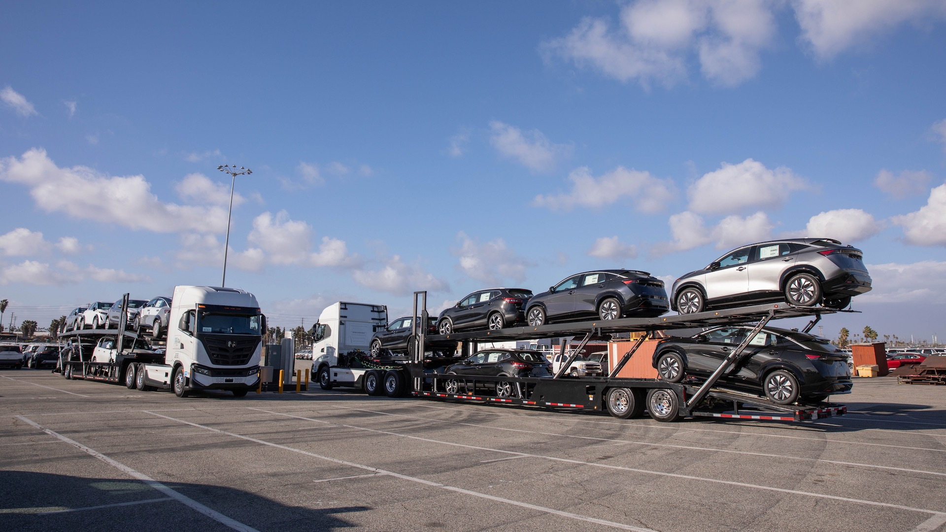Nikola Tre electric semi trucks delivering Nissan vehicles in the Los Angeles area