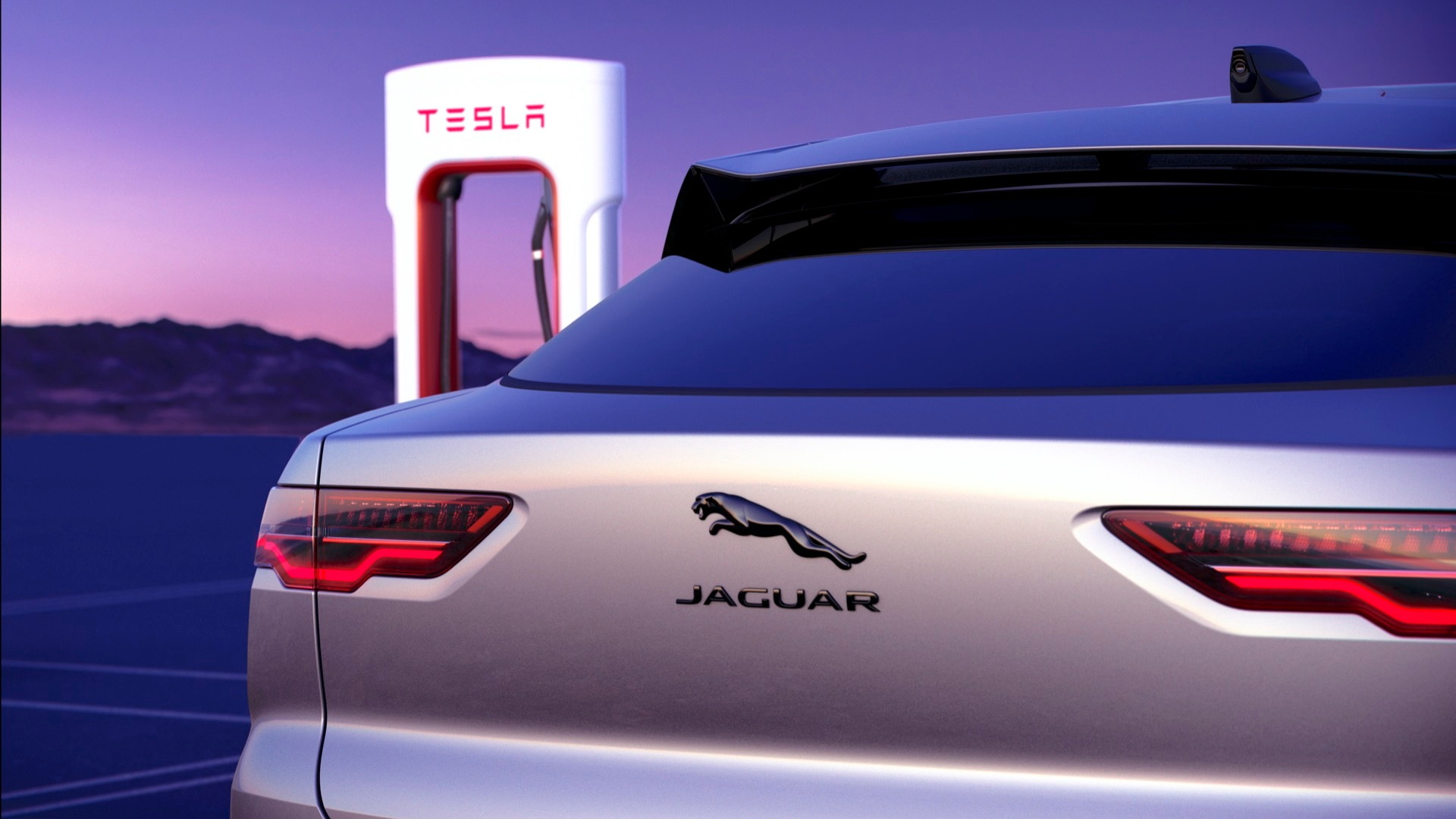 Jaguar I-Pace and Tesla Supercharger station