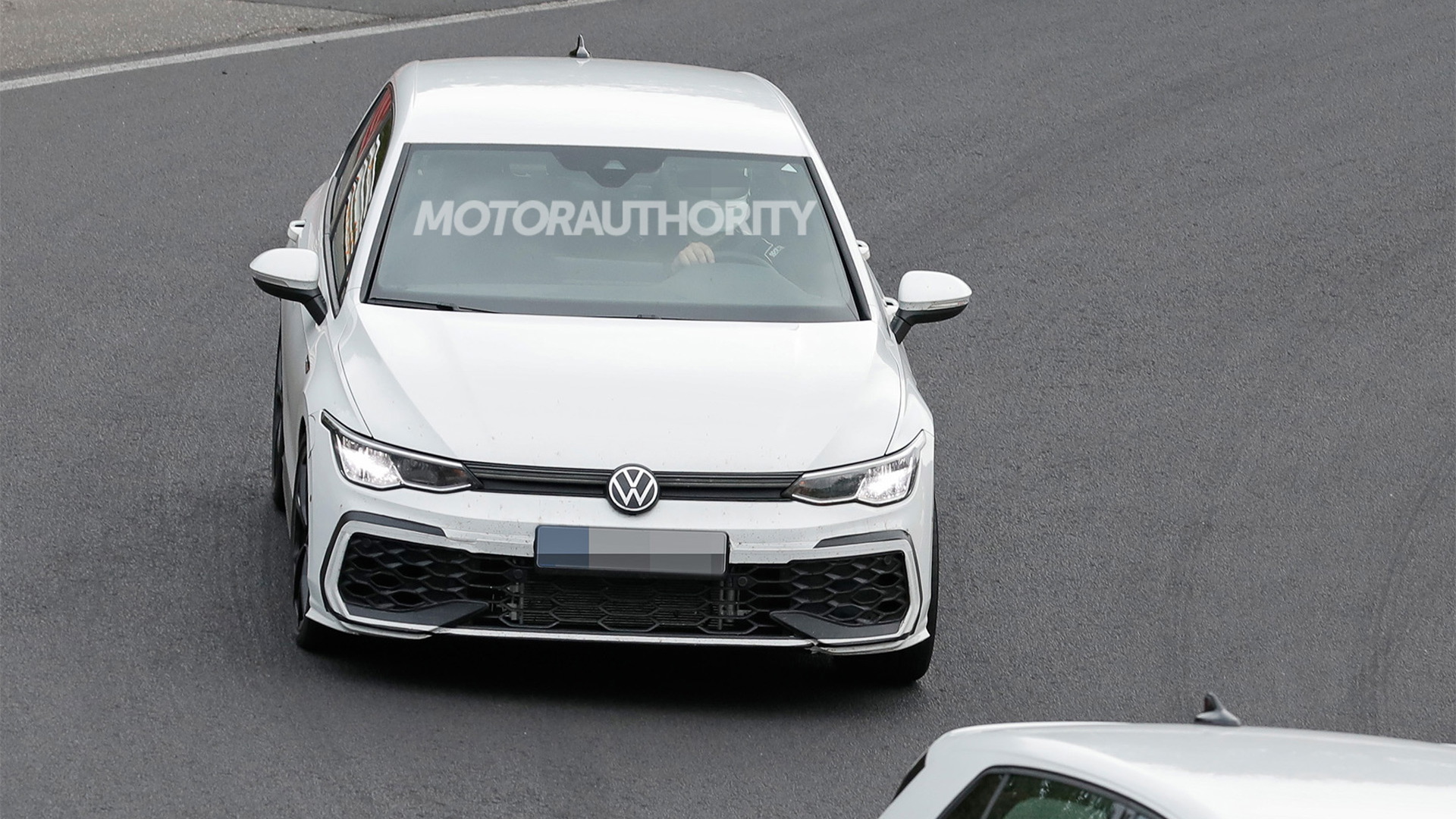 2025 Volkswagen Golf GTI facelift spy shots - Photo credit: Baldauf