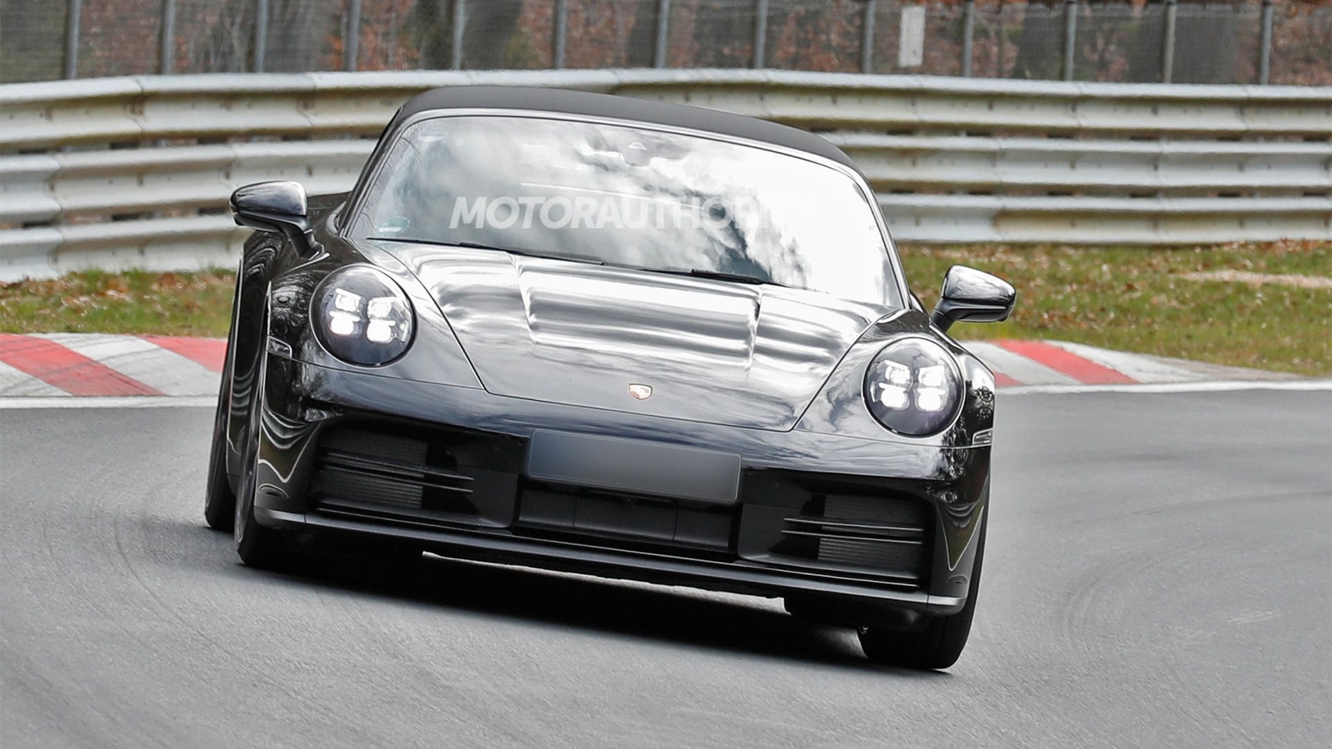 2025 Porsche 911 Carrera facelift spy shots - Photo credit: Baldauf