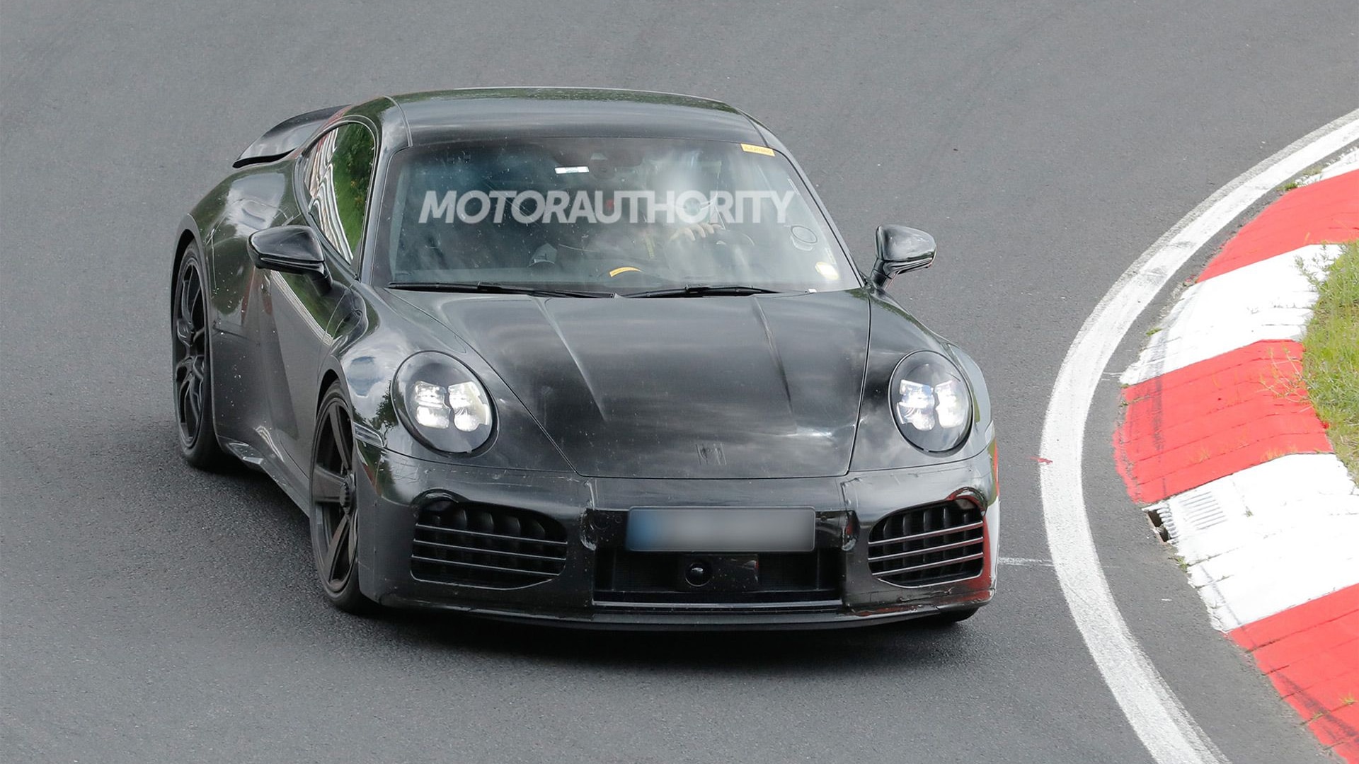 2026 Porsche 911 Turbo S Touring spy shots - Photo credit: Baldauf