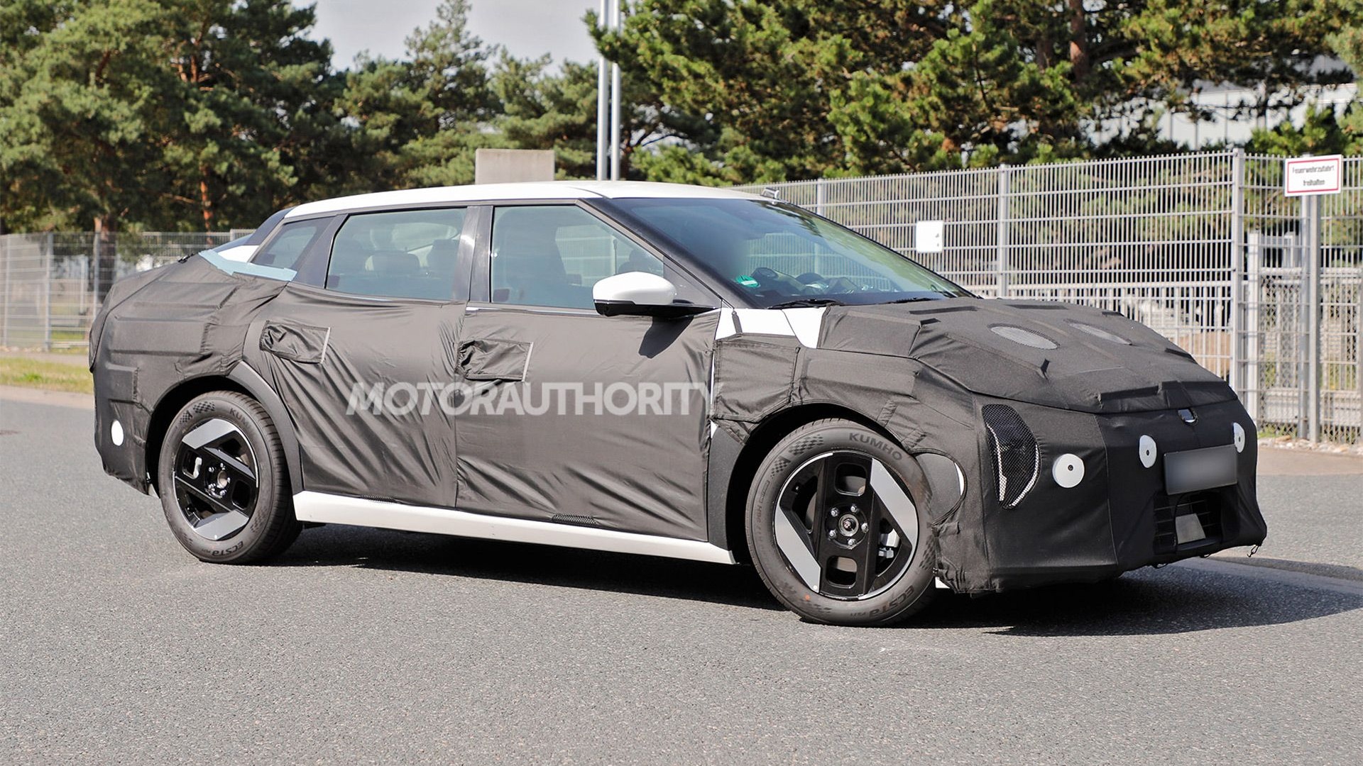 2026 Kia EV4 liftback spy shots - Photo via Baldauf