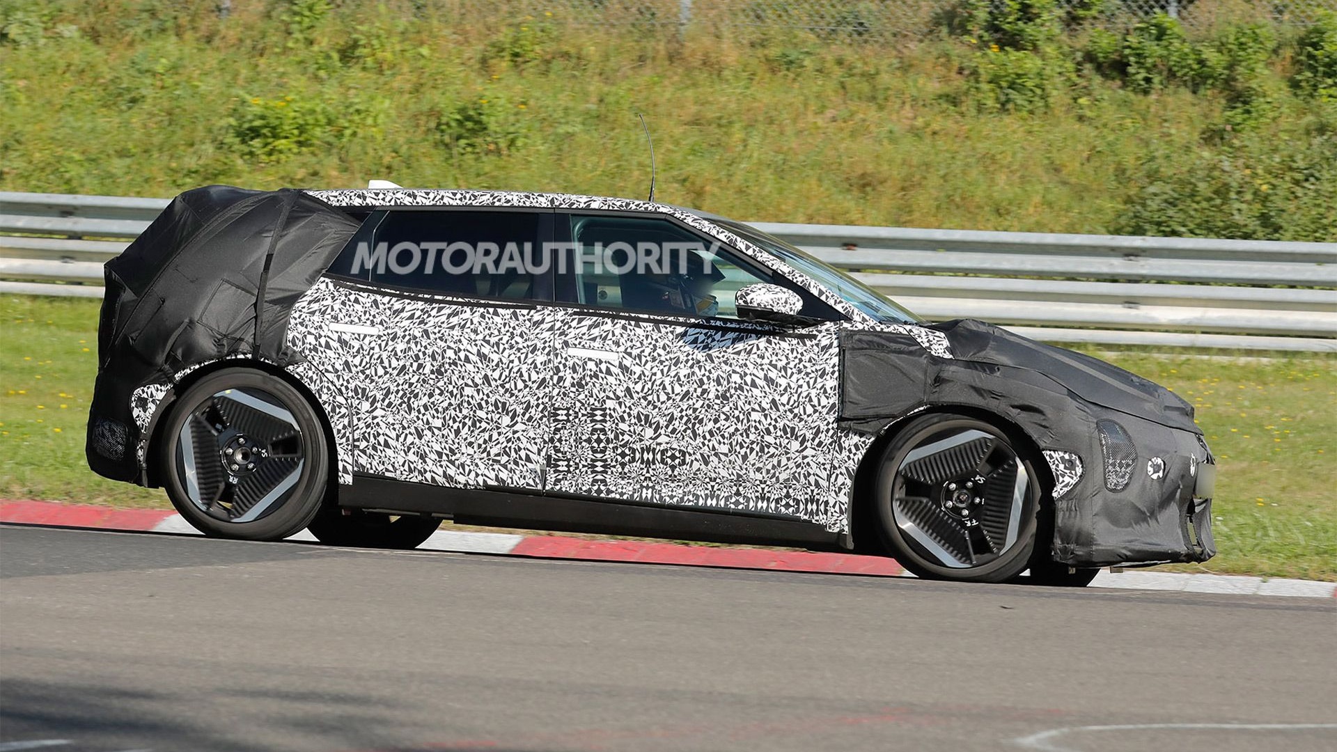 2026 Kia EV4 hatchback spy shots - Photo via Baldauf