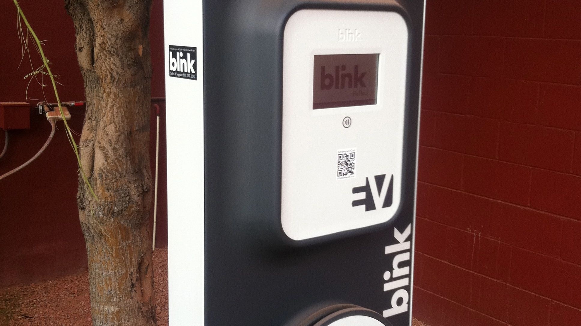 ECOtality Blink charging station, showing sticker on the side with 800 number