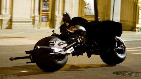 Batman astride the Batpod in the ‘The Dark Knight Rises’