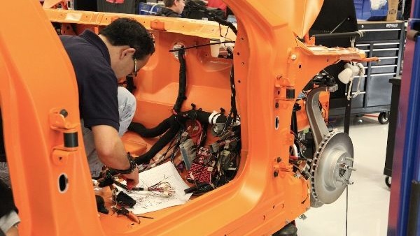 Tesla Model S workshop - wiring is installed in VIN # 13, a crash-test vehicle